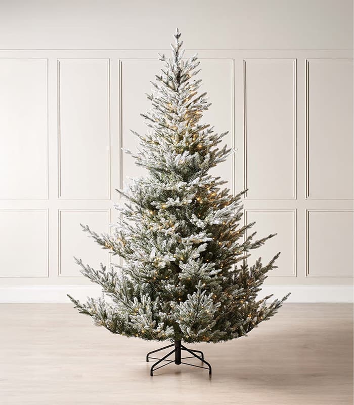 Prelit snow flocked christmas tree.jpeg